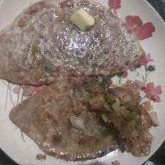 A picture of Onion & Capsicum Stuffing Paratha.