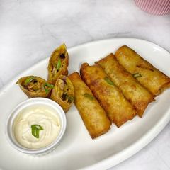 A picture of Chicken vegetable spring rolls.
