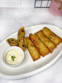 A picture of Chicken vegetable spring rolls.