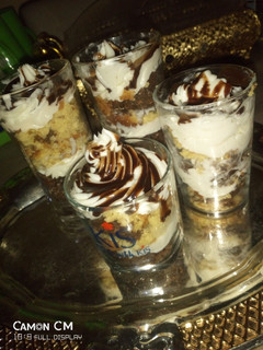A picture of Cake in a cup.