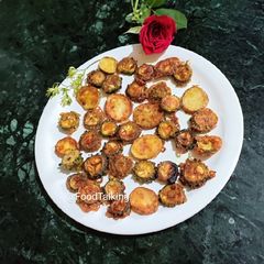 A picture of Crispy Karela (Bitter gourd) potatoes.