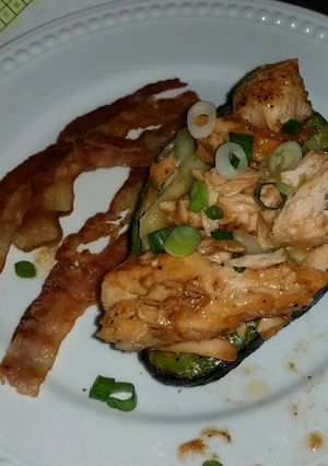 A picture of Baked Egg in Avocado with Brie and Salmon.