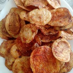 A picture of Fried potatoes with daal.