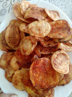 A picture of Fried potatoes with daal.