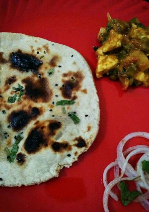 A picture of Tava naan with mix veg.
