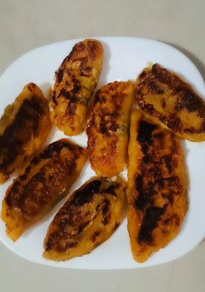 A picture of Sweet Plantain Empanadas with Beans and Cheese.