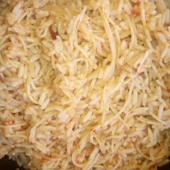 A picture of Simple jollofrice with spaghetti.