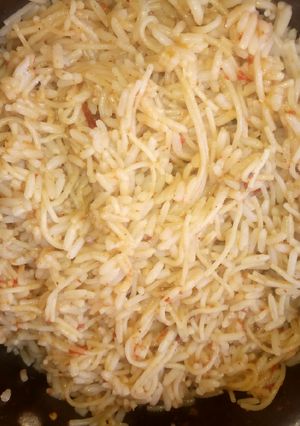 A picture of Simple jollofrice with spaghetti.