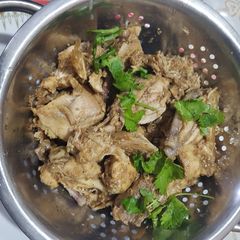 A picture of Ukwaju/tamarind chicken.