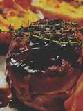 Lomo envuelto en panceta al tannat con papas rellenas