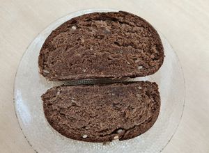 Una foto de Pan de harina de algarroba, pipas 🌻 y error... 🤷‍♀️