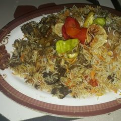 A picture of Kache gosht ki beef biryani.