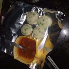 A picture of Rava idli with tomato soup.