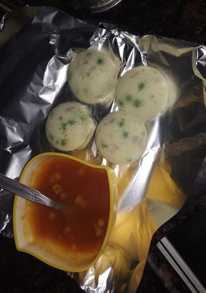 A picture of Rava idli with tomato soup.