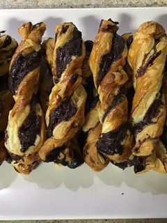 Una foto de Ricitos de hojaldre con crema de chocolate