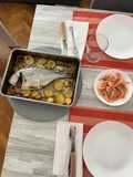 Dorada con patatas y gambas