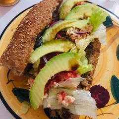 A picture of Crab sandwich with whole wheat bread.