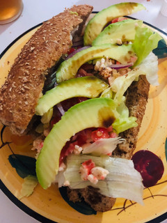 A picture of Crab sandwich with whole wheat bread.