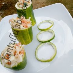 A picture of Cucumber filled salad.