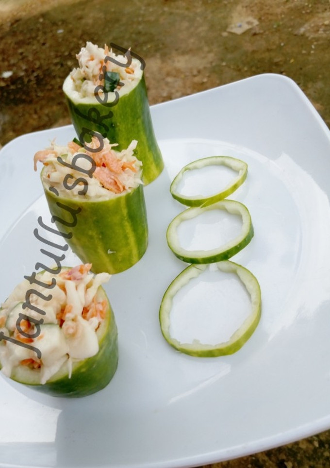 A picture of Cucumber filled salad.
