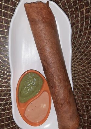 A picture of Red Lentil Cheesy Schezwan Dosa.
