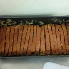 A picture of Meat loaf with bacon strips.