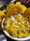 Creamy mango rabri with jalebi