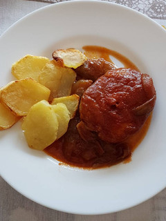 Una foto de Merluza con tomate