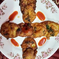 A picture of Potato green leaves pakoda.