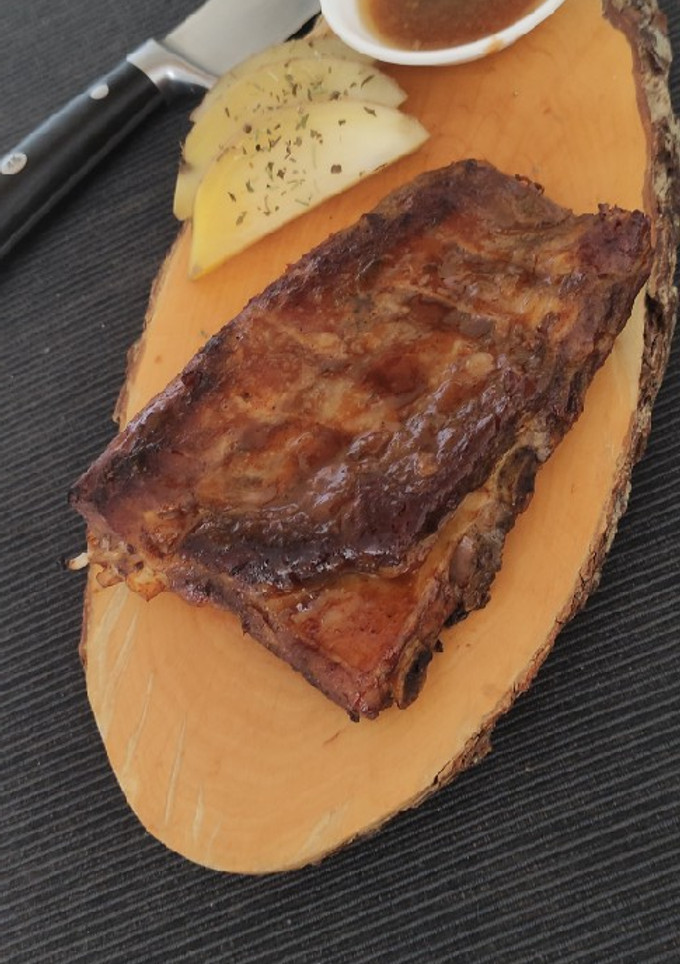 Una foto de Costillar BBQ asado a baja temperatura