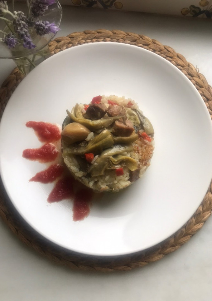 Una foto de Timbal de arroz con lomo de orza y verduritas