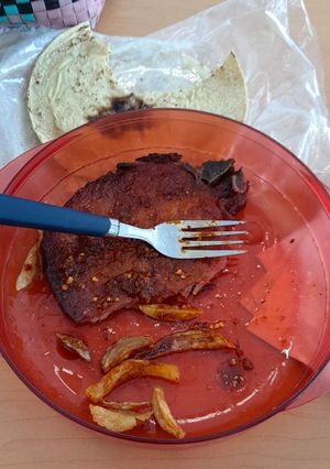 Una foto de Chuletas ahumadas con papas