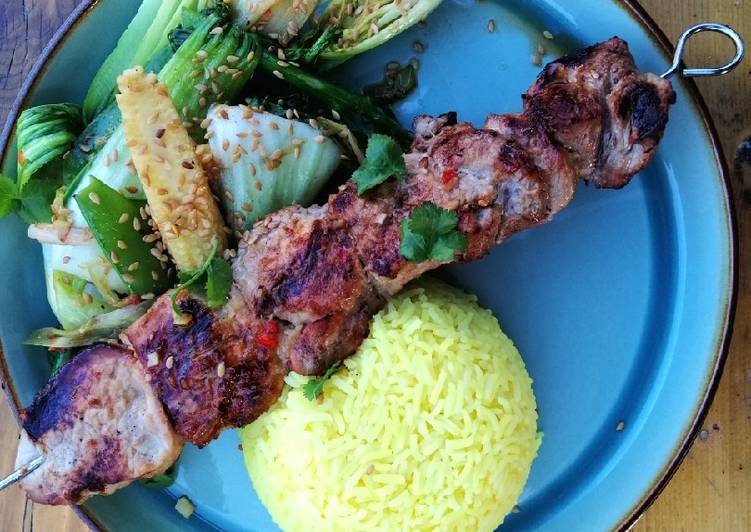 Recipe of Ultimate Asian style pork kebabs, steamed veg and yellow rice