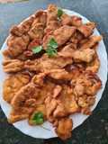 30. Pechuga de pollo empanada