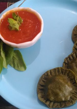 A picture of Spinach rivoli with tomato cream sauce.