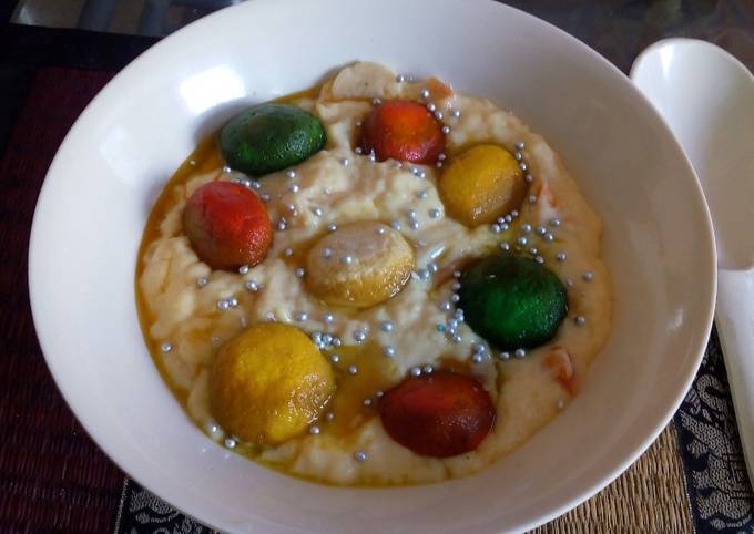 Colourful rasgulla in custard