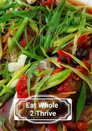 A picture of Steamed bass with scallions, pickled chillies and Ginger葱油鲈鱼.