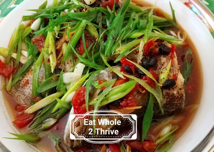 Steamed bass with scallions, pickled chillies and Ginger葱油鲈鱼
