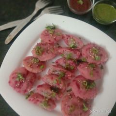 A picture of Stuffed beetroot Mini Idli.