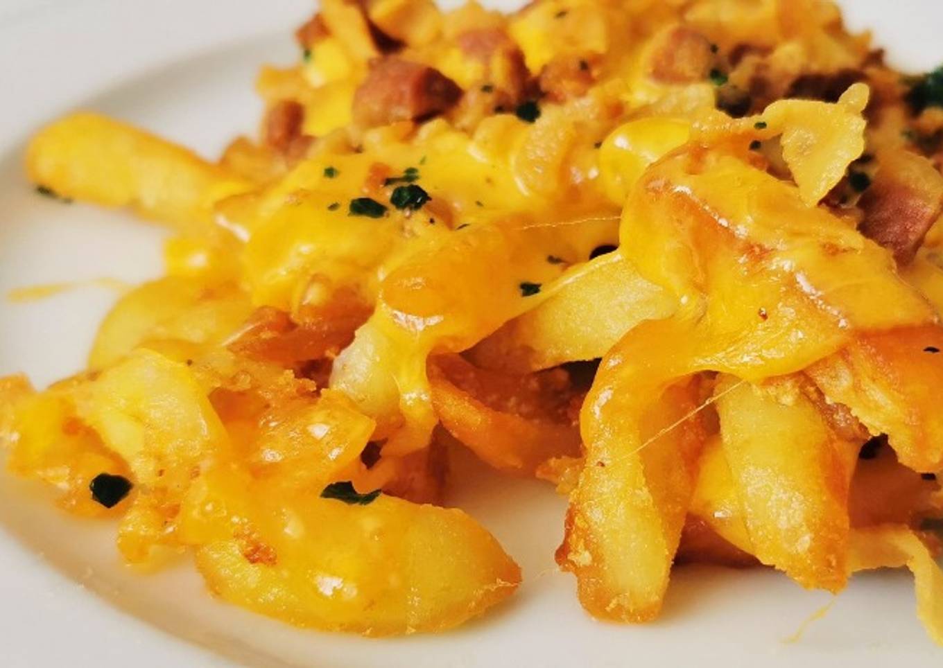 Patatas francesas con Panceta y Queso