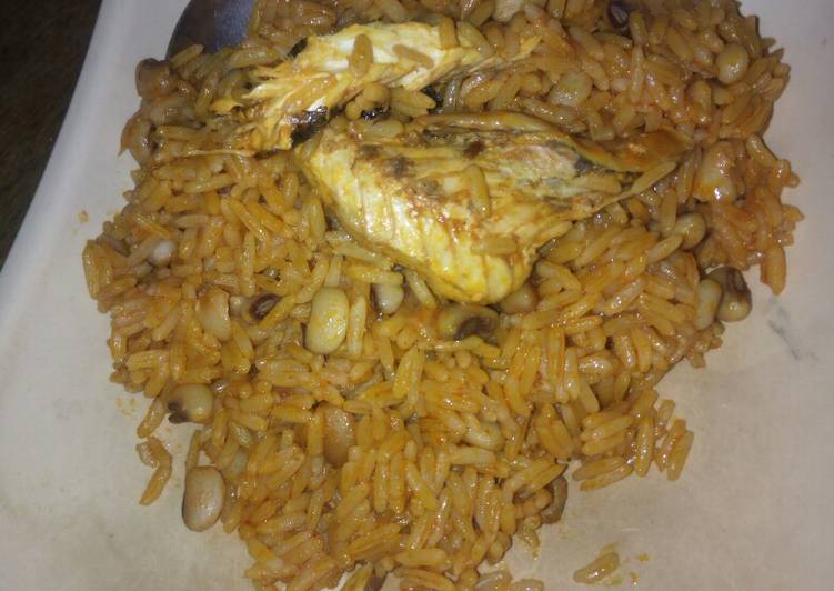 Jollof rice and beans with smoked fish