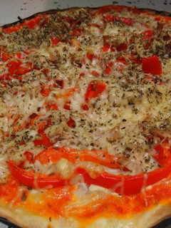 Una foto de Pizza de atún