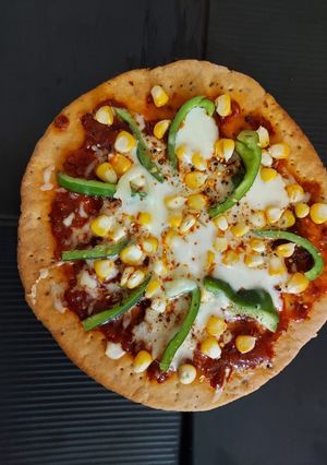 A picture of Capsicum Corn Cheese Pizza.