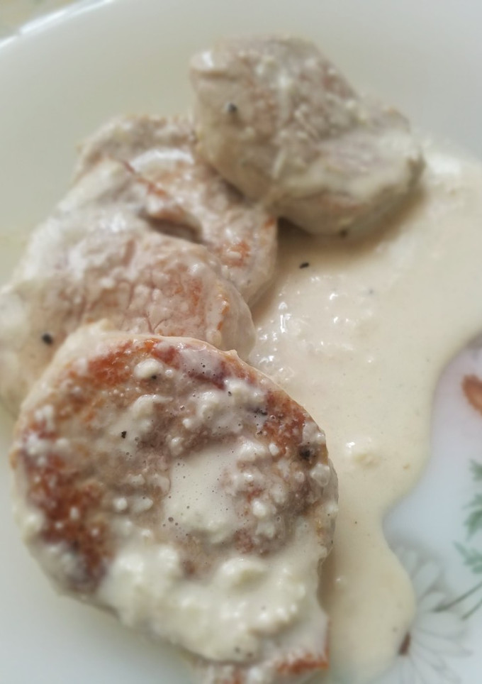 Una foto de Solomillo de cerdo con salsa de queso azul