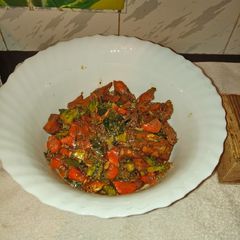 A picture of Chicken and Broccoli stir fry.