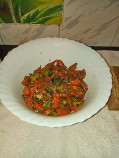 A picture of Chicken and Broccoli stir fry.