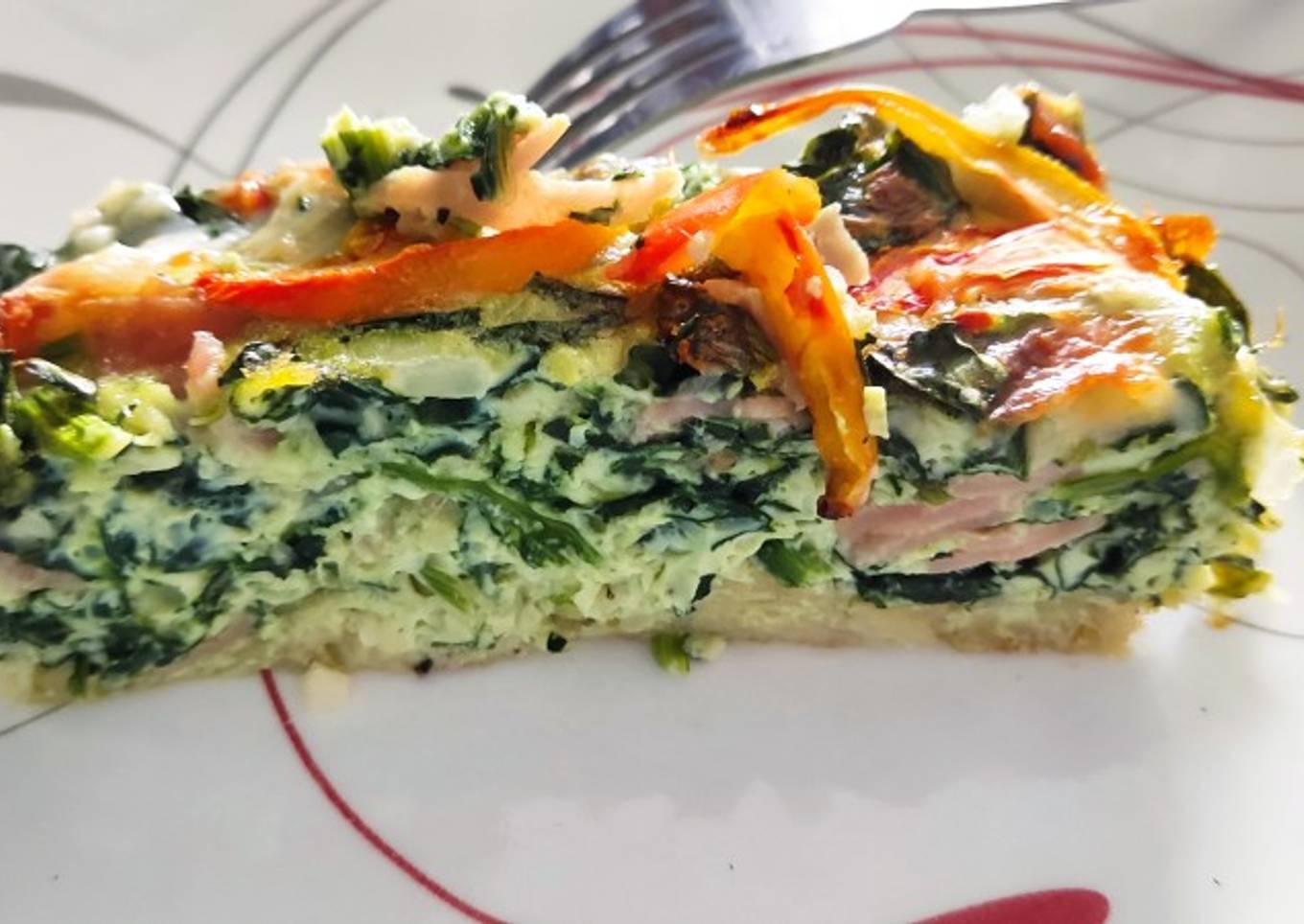 Quiche de espinaca en cama de papa