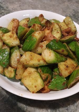 A picture of 沙茶黃瓜（Vegan）BBQ source with cucumber.