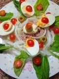 Ensalada de Atún con papas rúcula cebolla, Huevos y cherry