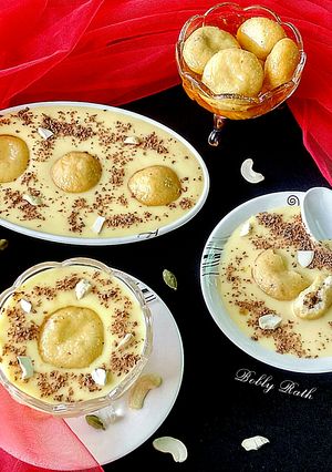 A picture of Chocolate filled rasgulla in chilled custard.